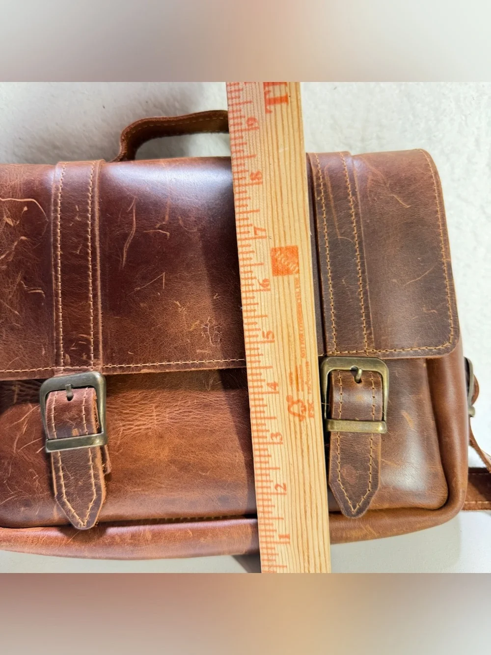 leather satchel crossbody bag with a structured flap front double buckles